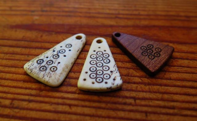 Bone and wood amulets