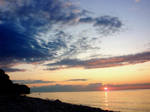 Sunset over the sea by SnowWhiteApple