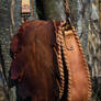 brown hand carved oak leaf purse with toggle faste