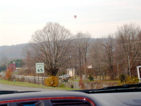 Hot air balloons floating by..