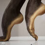 Black feet doing ballet movements