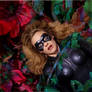 Batgirl trapped in Ivys ceiling of vines
