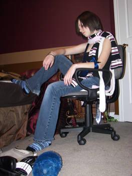 001 - Sitting. In a chair.