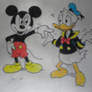 Mickey is pointing at the Donald