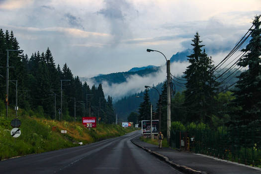 Road trip to mountain with dense fog