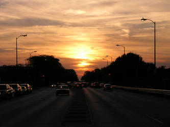 Sunset On The Busy Street