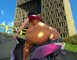 Huge ass on a motorcycle on the city