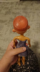 back of the doll but had lost the hair
