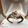 Rose in thorns engagement ring