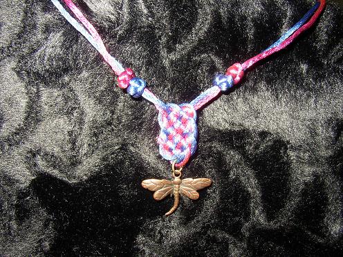 dragonfly with prosperity knot