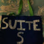 Suite S banner front