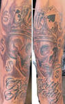 Skull and crown dirty money tattoo