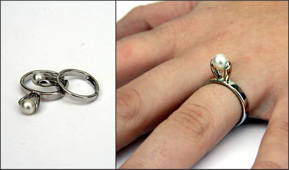 Pearly white ring adjustable silver colored band