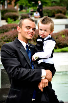 Father and Son Attending Wedding