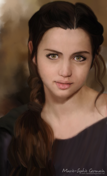 Portrait of a young woman with olive green eyes