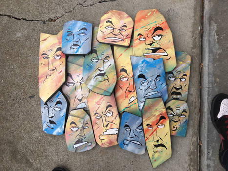 Wood faces with spray paint and paint markers