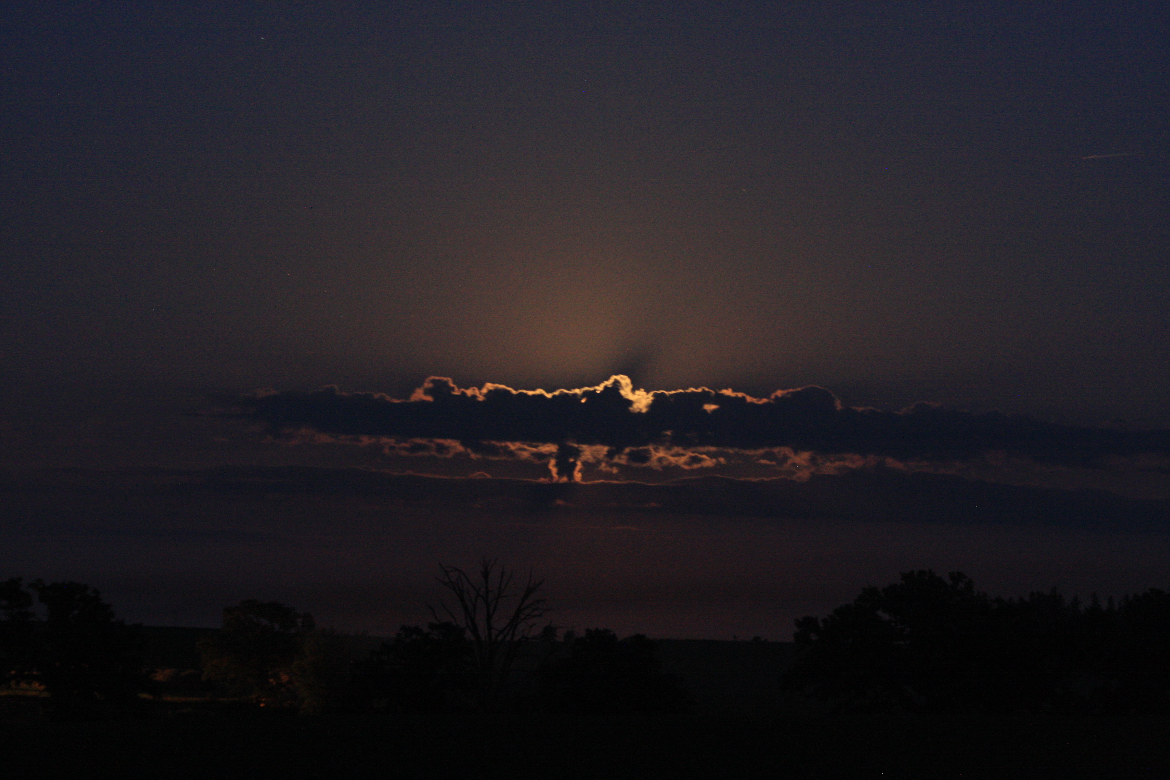 Moon Behind the Clouds