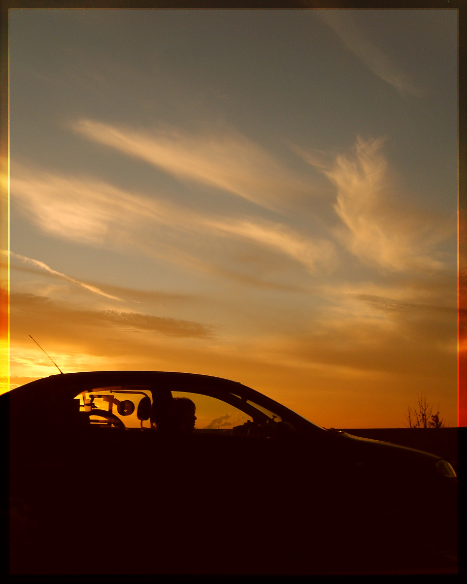 sundown + car on the autobahn