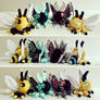 Mothman and bee plushies