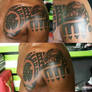 Tribal chest and shoulder tattoo