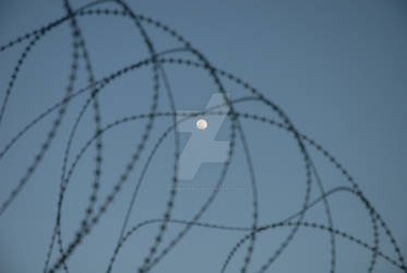 Afghanistan moon and razorwire