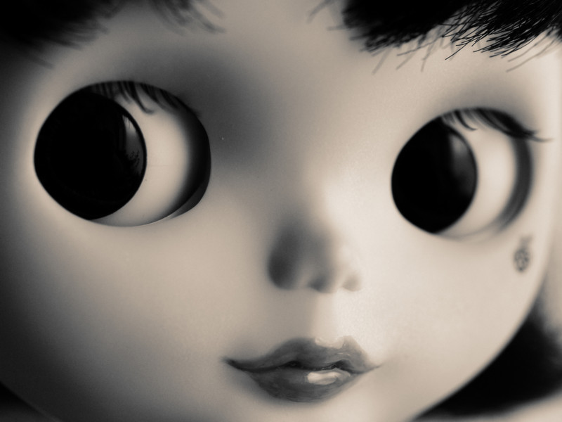 creepy doll with big eyes