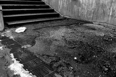 Stairs and broken asphalt