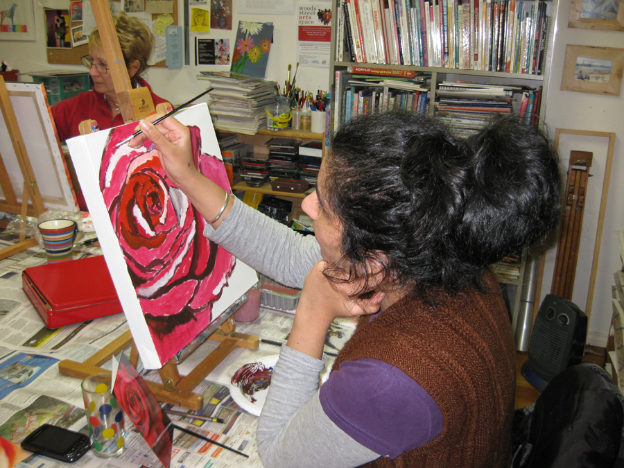 Harmen painting a rose