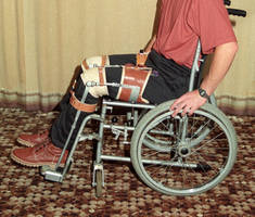 Vintage leg braces and wheelchair