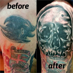 skull coverup tattoo