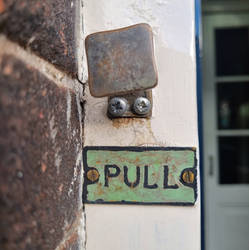 Etched doorbell plate