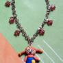 Necklace with Pippi Calzelunghe and pearls fimo