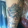 black and grey rose tattoo