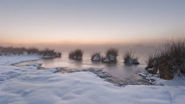 Winter mist over castle waters