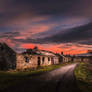 Old cottages during sunset