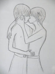 Two boys kissing