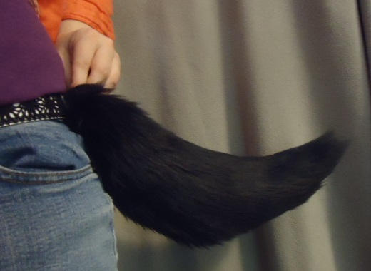 Black fur tail