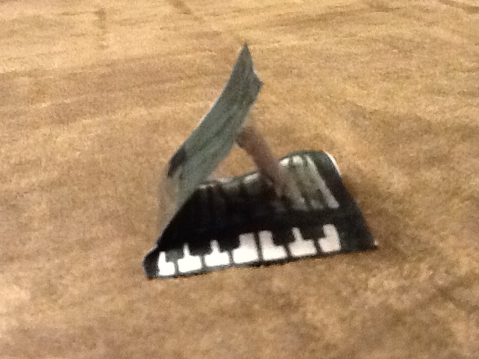 World's smallest grand piano on my couch