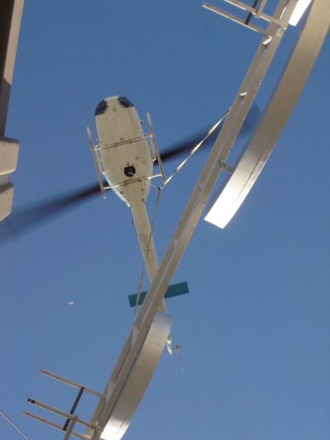 Copter lift of old SBC sign.