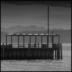 Woman waits for a ship