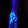 Filigree blacklight tattoo
