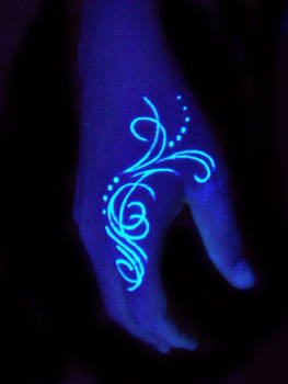 Hand blacklight tattoo