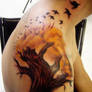 tree tattoo with birds