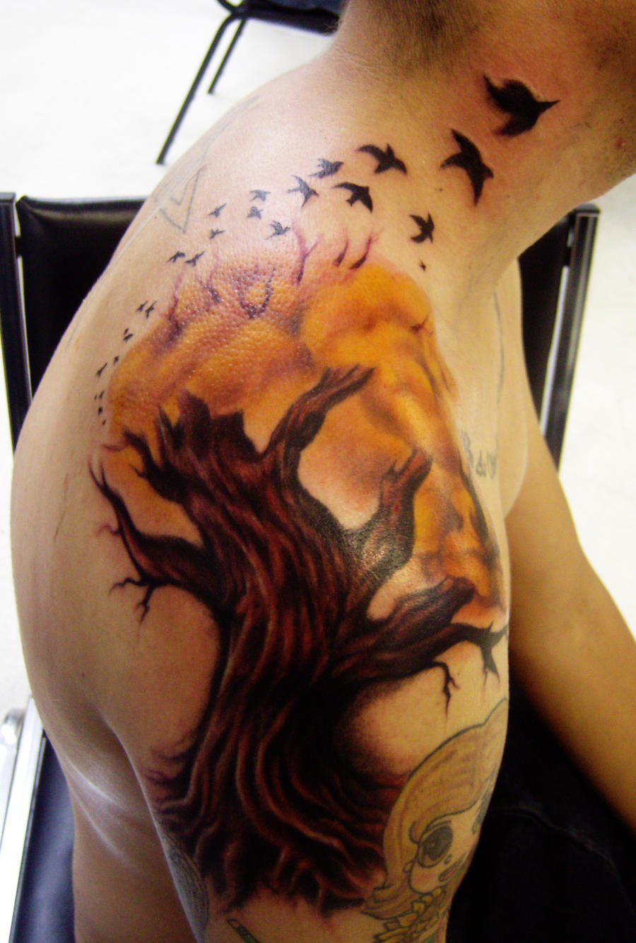 tree tattoo with birds