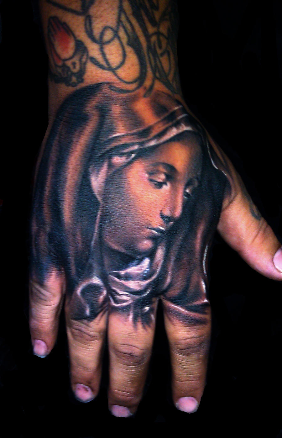 Virgin delorosa hand tattoo