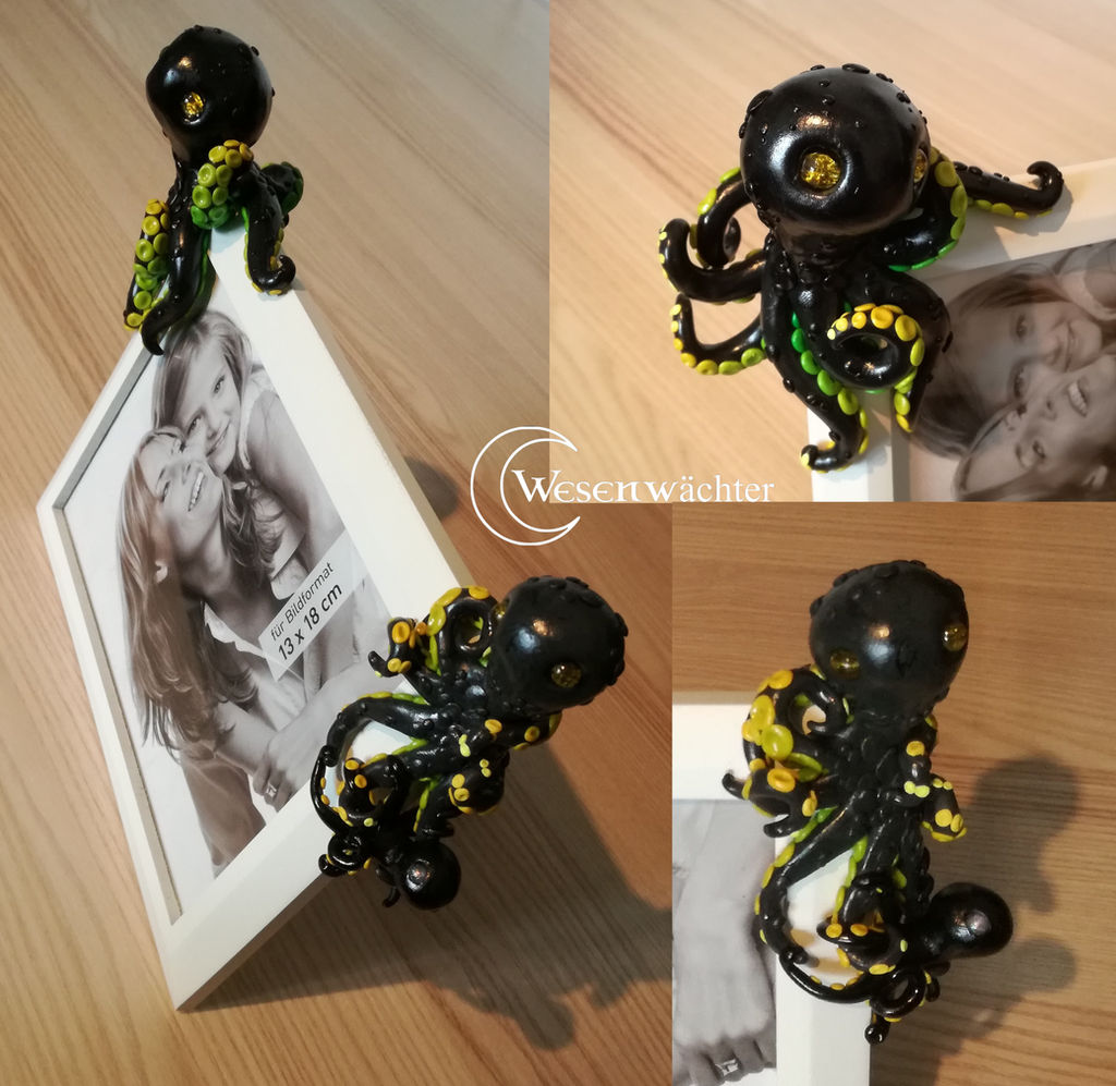 1# picture frame - black/yellow colored octopus