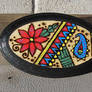 Small oval abstract plaque