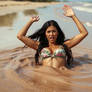 A Photorealistic Image Of Leilani A Beautiful Woman With Long Dark Hair Wearing A Floral Bikini To B