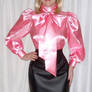 Shiny silk pink bow blouse and leather skirt