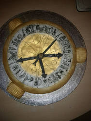 Alethiometer cake